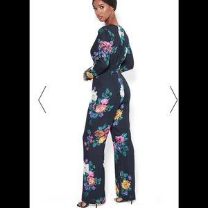 *Sold*Bebe Printed front tie jumpsuit.